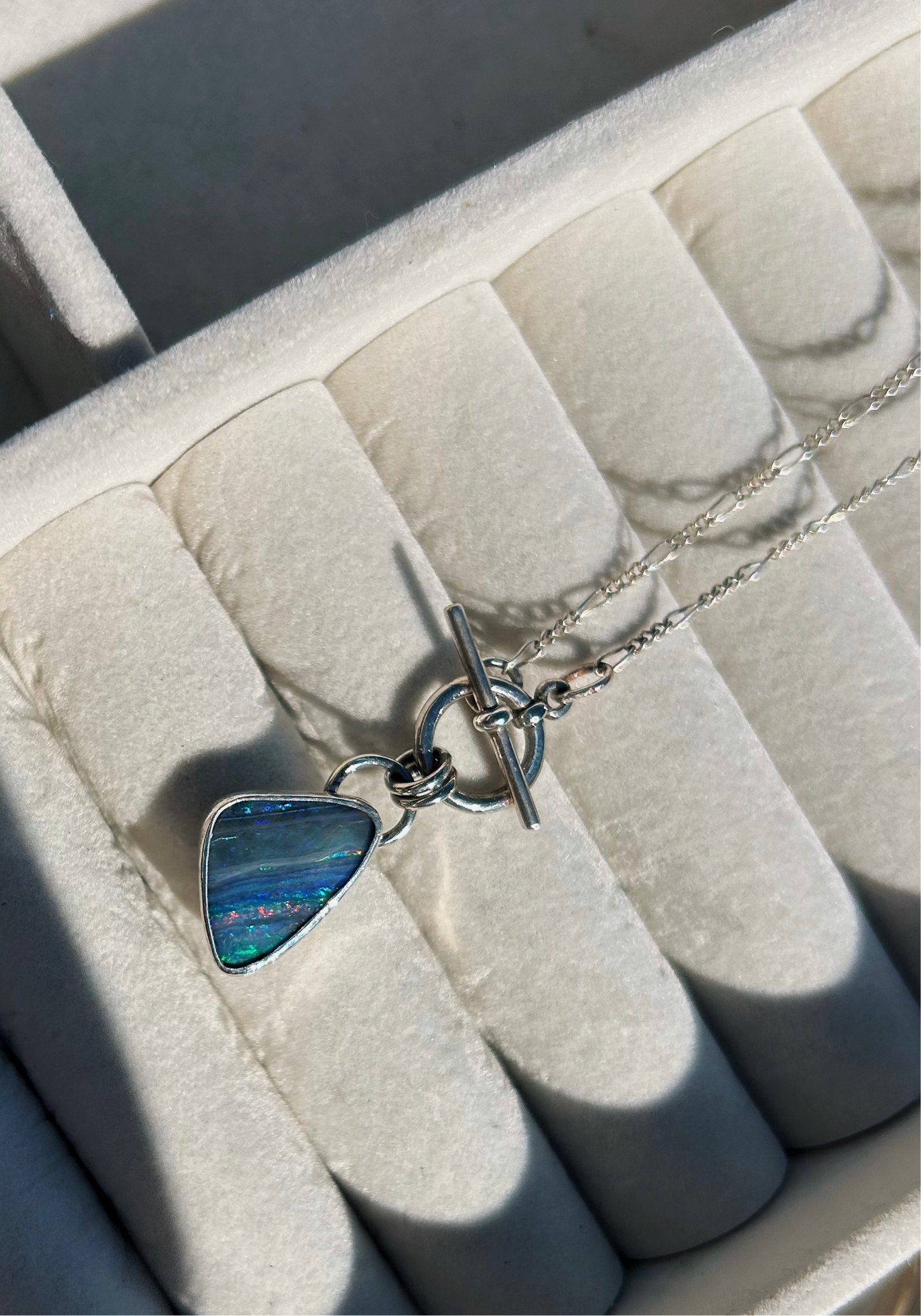 Blue rainbow confetti boulder opal toggle necklace. 16in. Figaro chain.