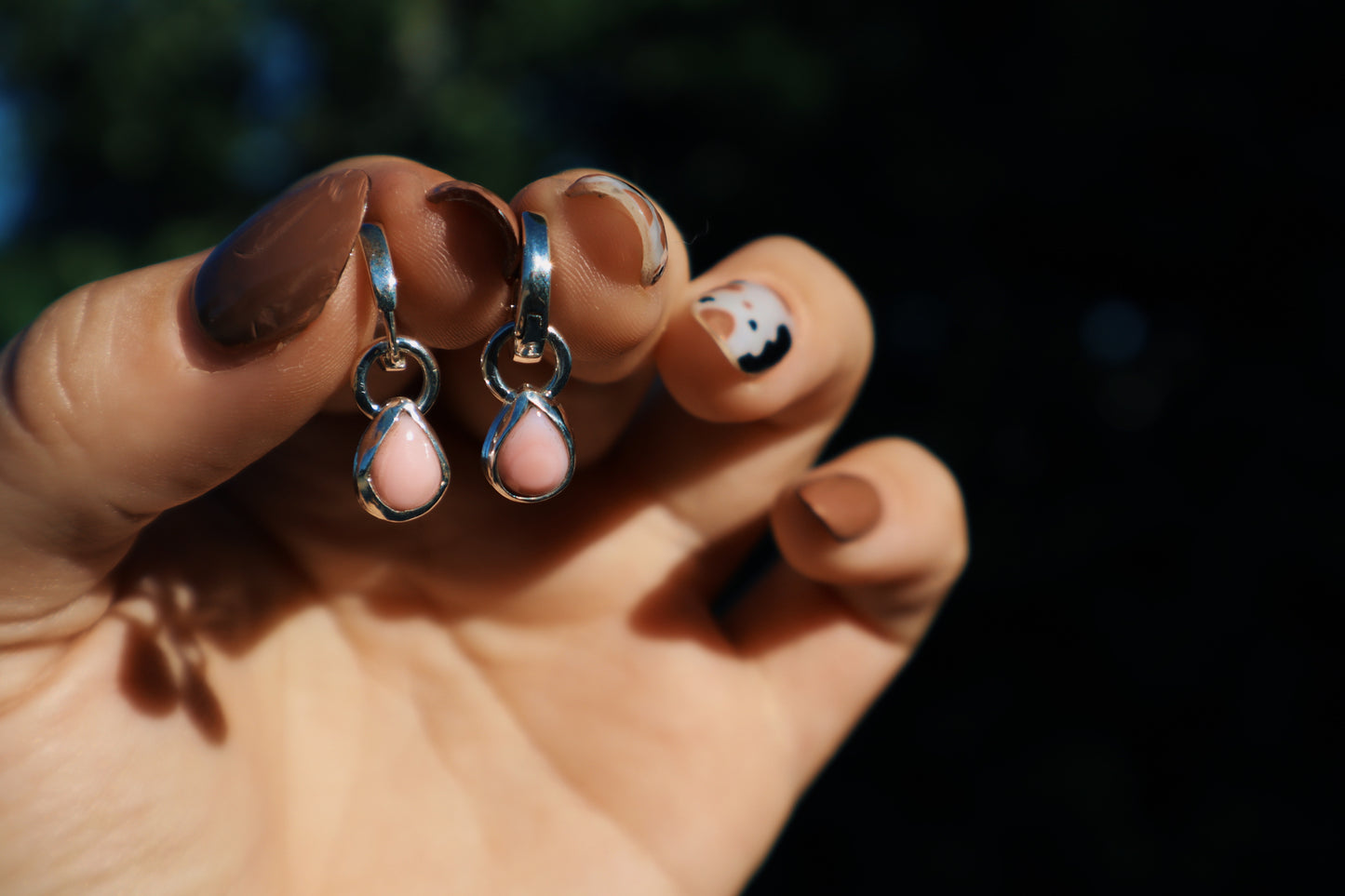 Pink conch huggie hoops