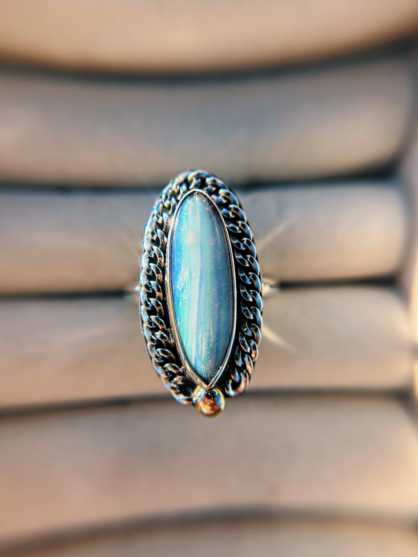 Swirly blue, curb chain and 14k gold. Size 9