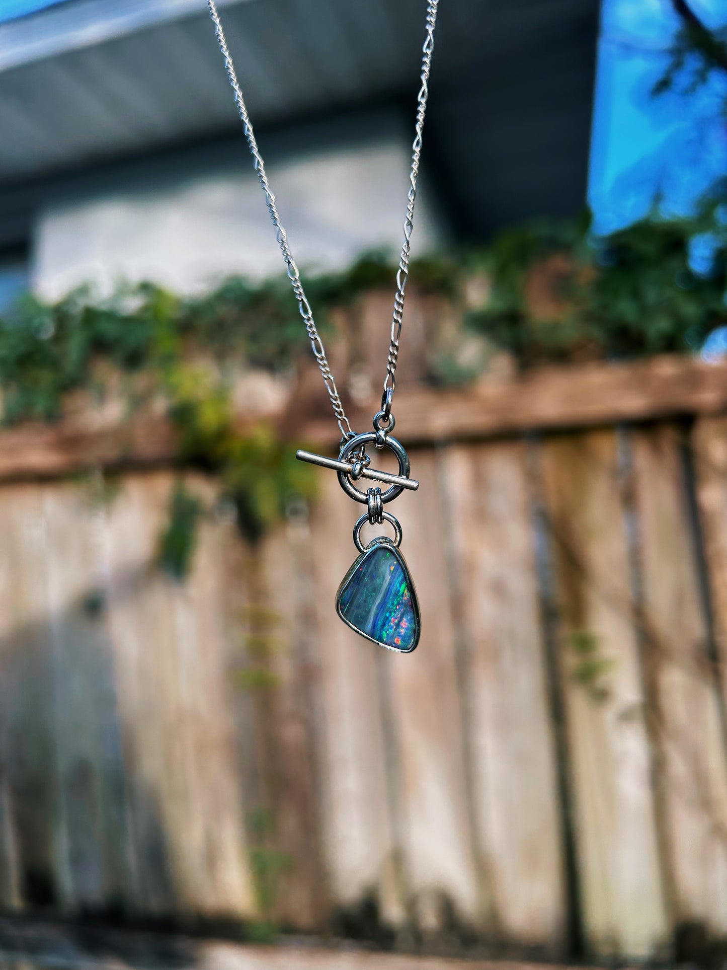 Blue rainbow confetti boulder opal toggle necklace. 16in. Figaro chain.