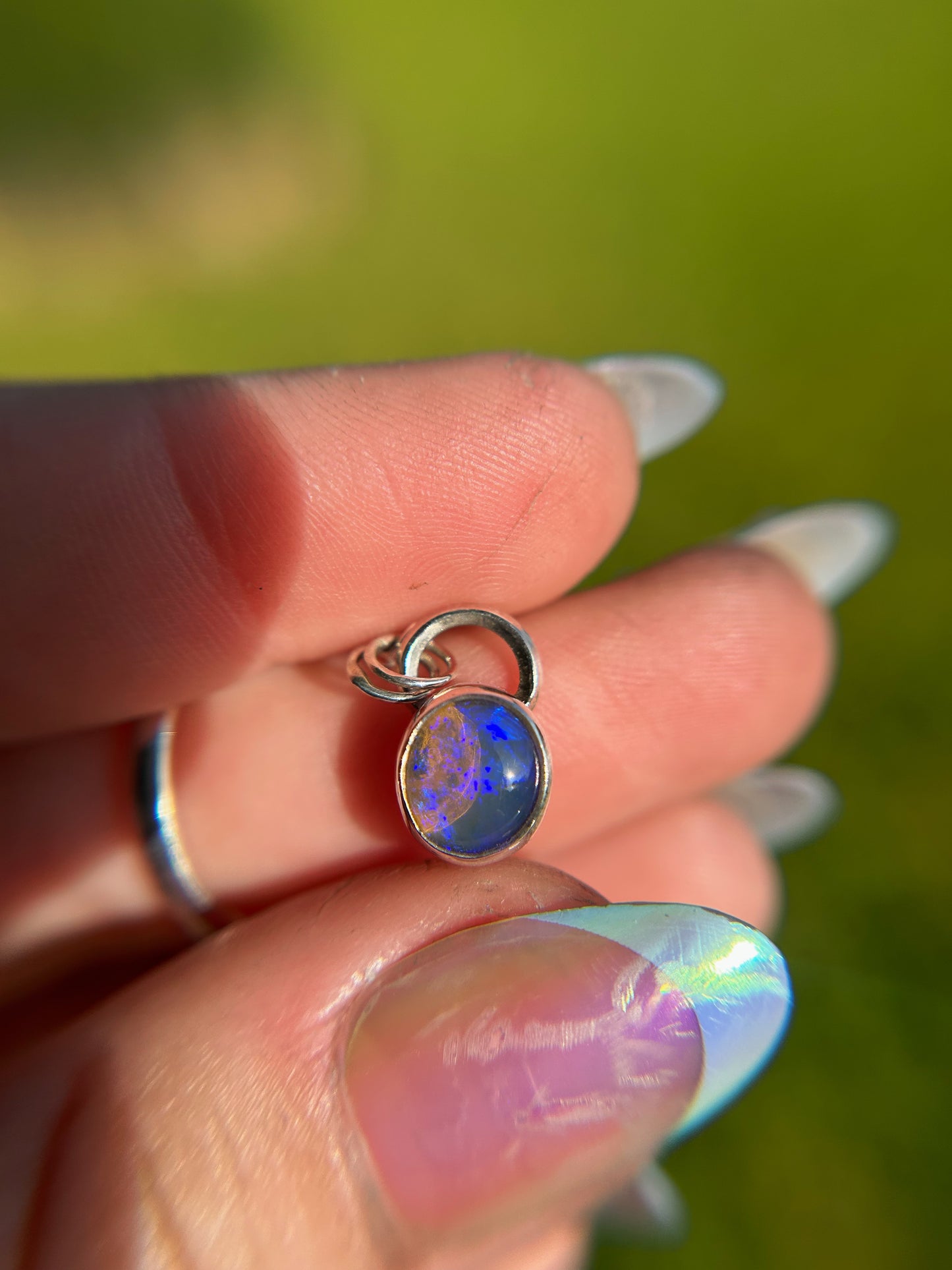 Dainty purple pipe opal pendant