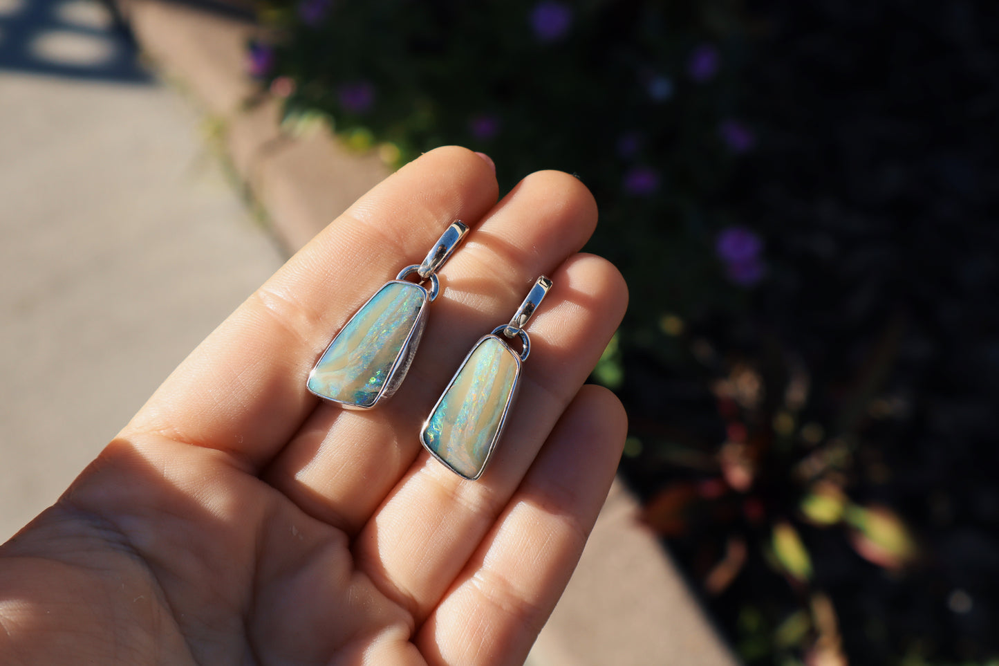 Flashy matching pair of pink swirl boulder opal huggie earrings. Sterling.