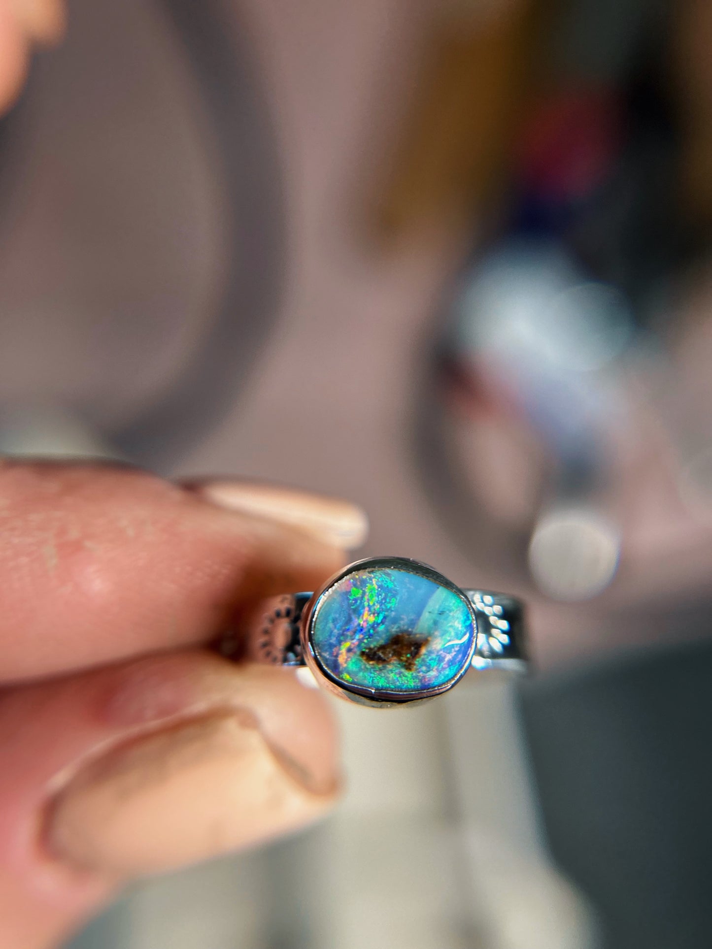 Petite size 5 boulder opal ring with sunburst band