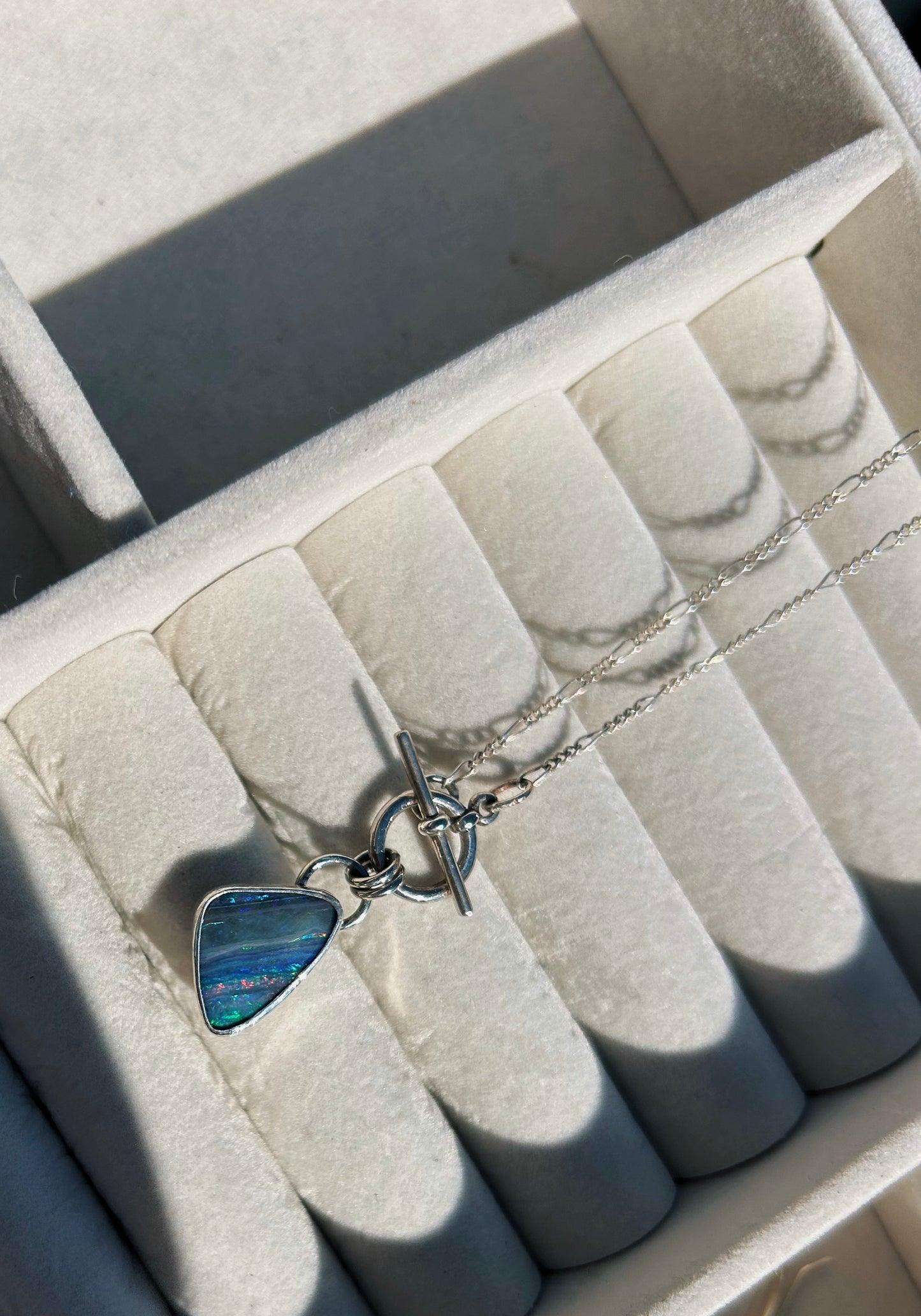 Blue rainbow confetti boulder opal toggle necklace. 16in. Figaro chain.
