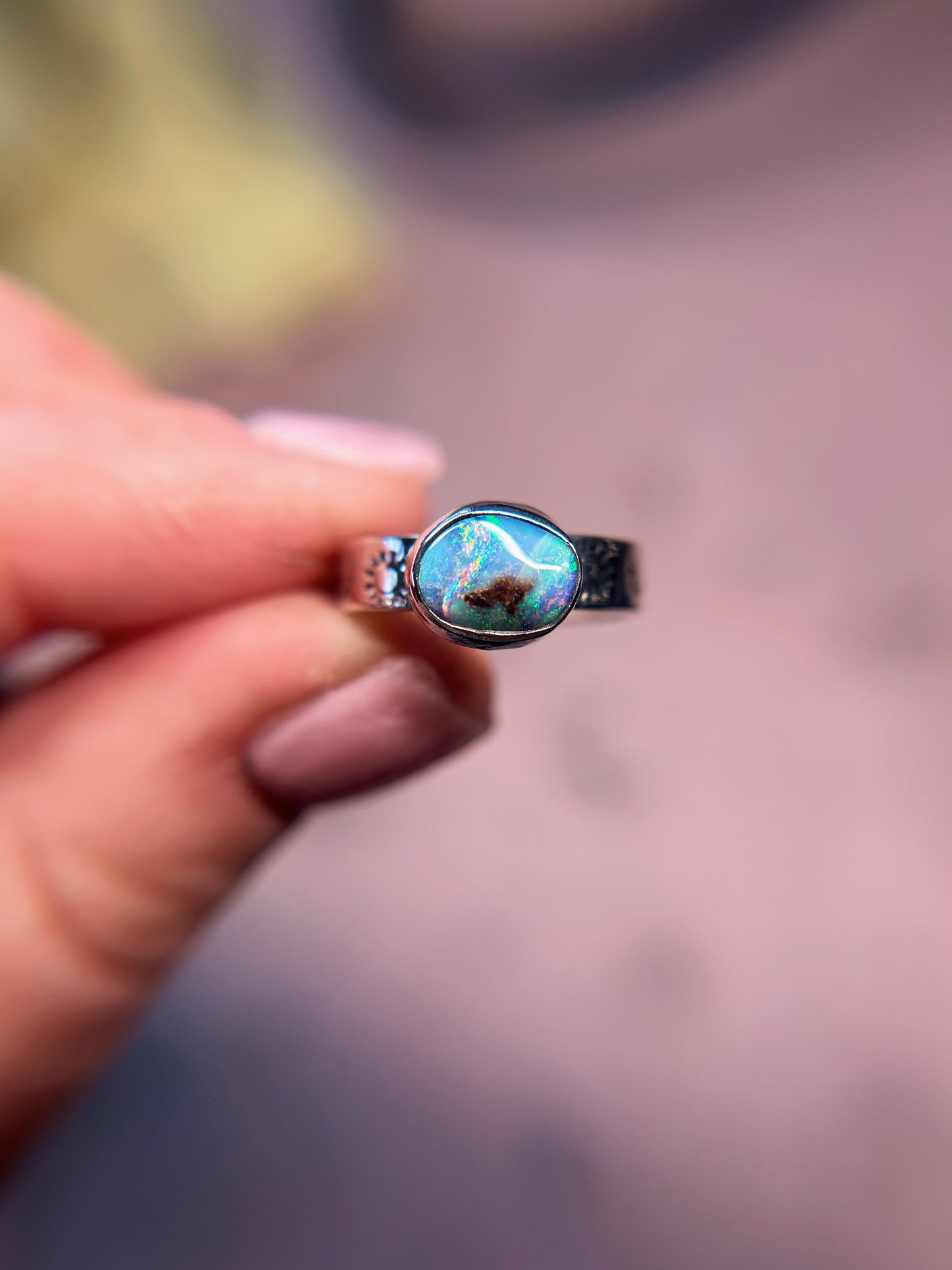 Petite size 5 boulder opal ring with sunburst band