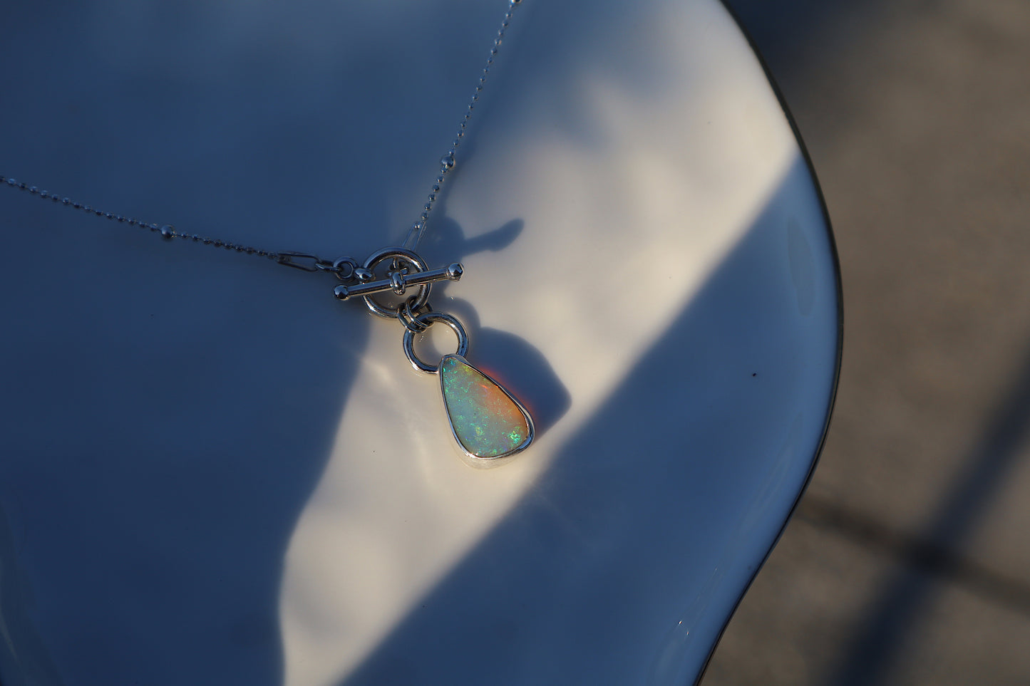 Blue green flashy Crystal opal necklace. 18 in satellite toggle style