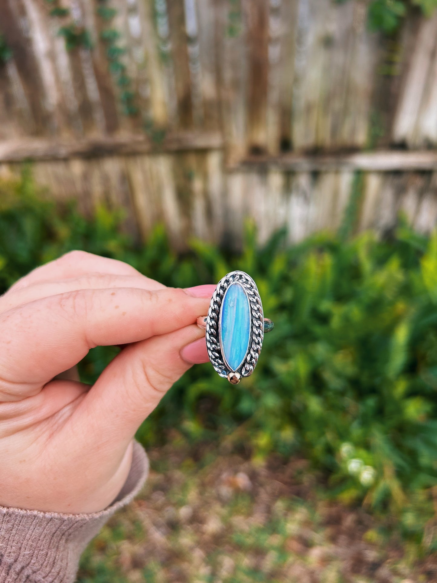 Swirly blue, curb chain and 14k gold. Size 9