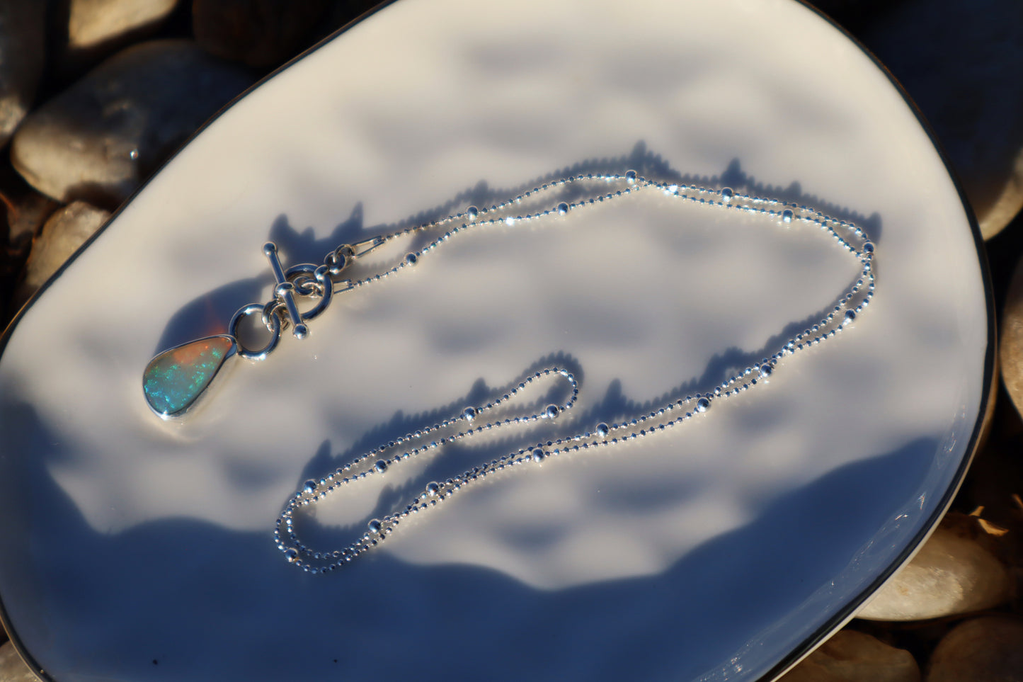 Blue green flashy Crystal opal necklace. 18 in satellite toggle style