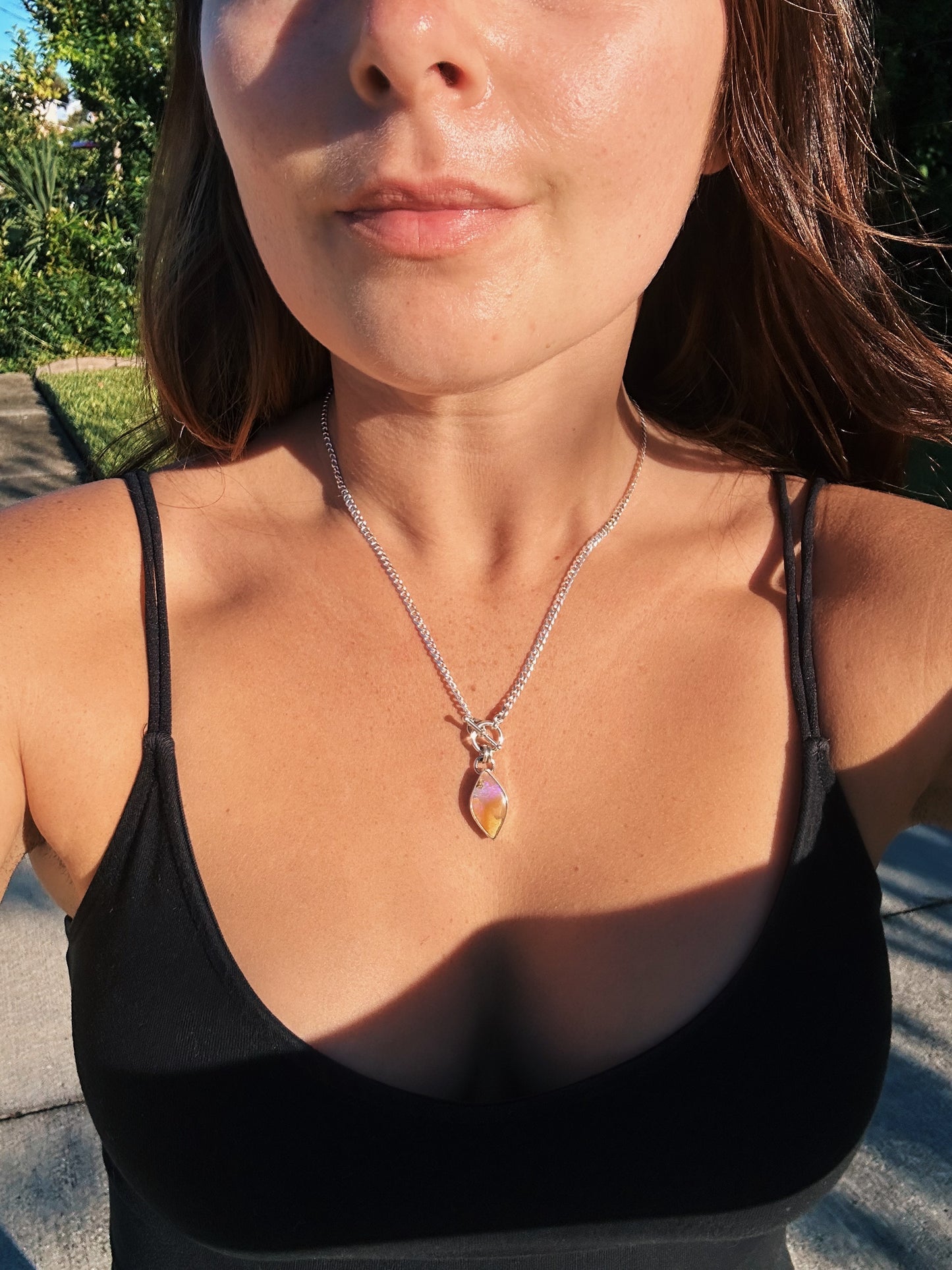 Stunning purple and caramel boulder opal toggle pendant. Sterling silver, 18 inches, diamond cut curb chain.