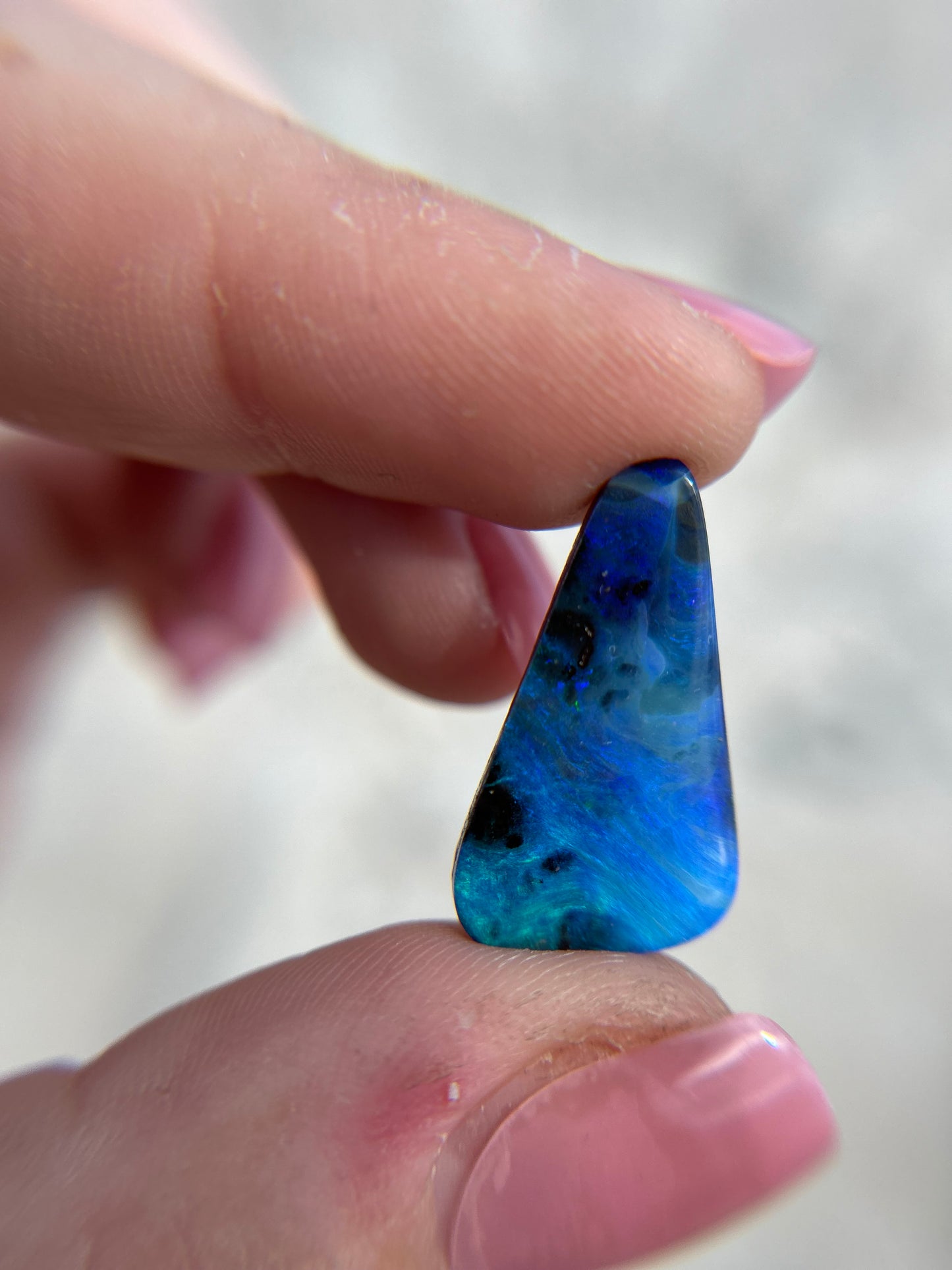 Big blue boulder opal finish in your size ring