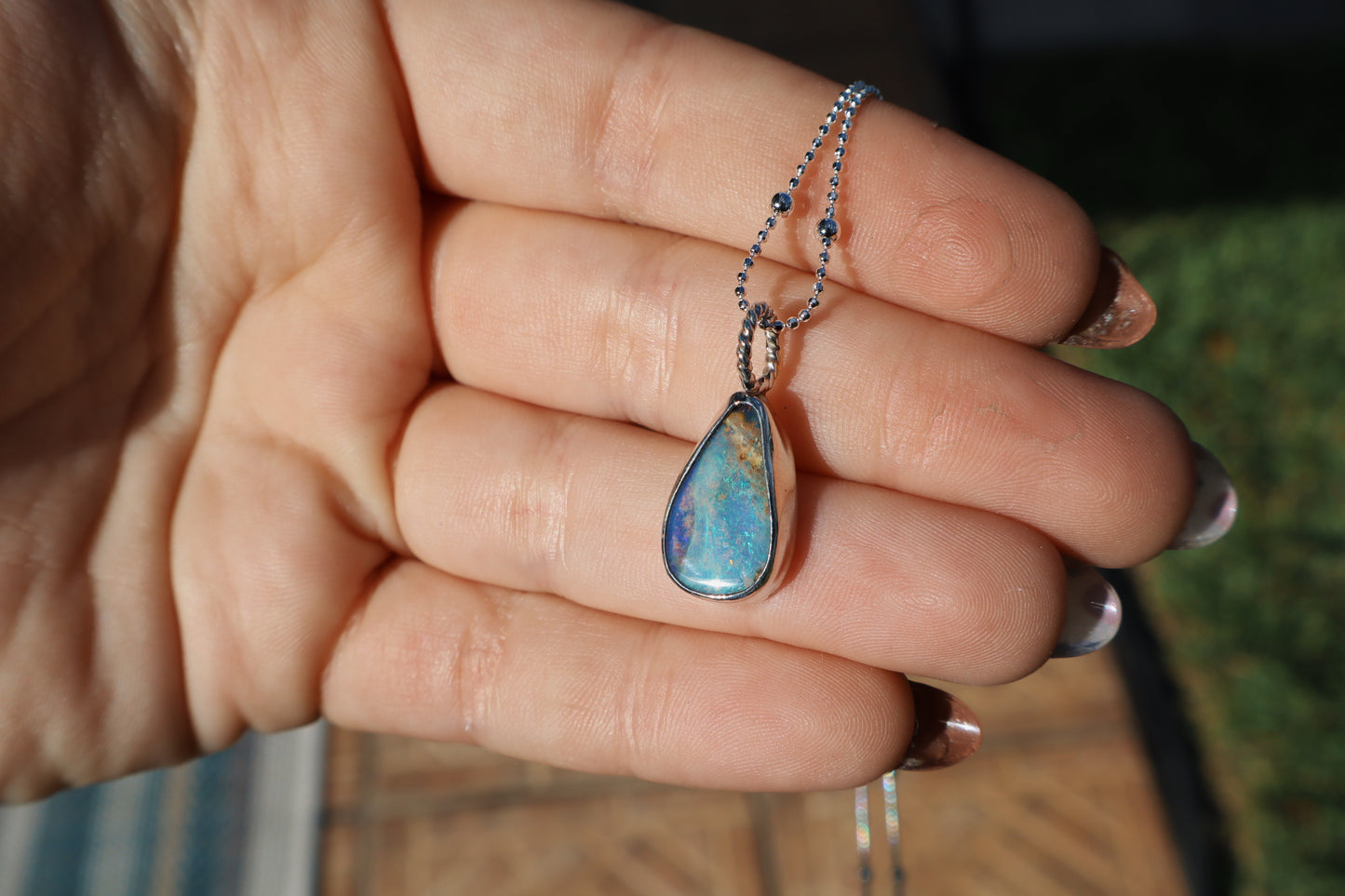 Beautiful swirly elongated opal pendant. 18 inch satellite chain