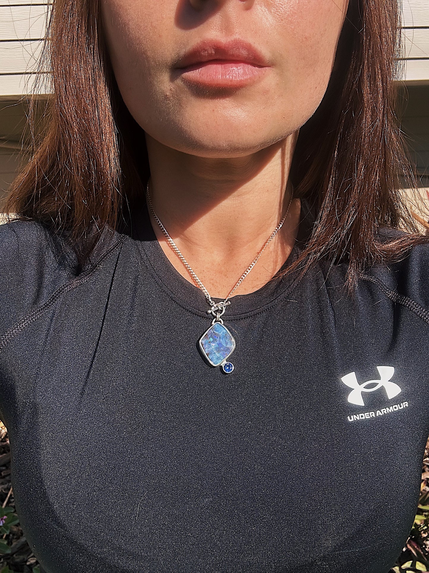 Large Blue boulder opal pendant and stunning blue Sapphire. 15in toggle clasp.