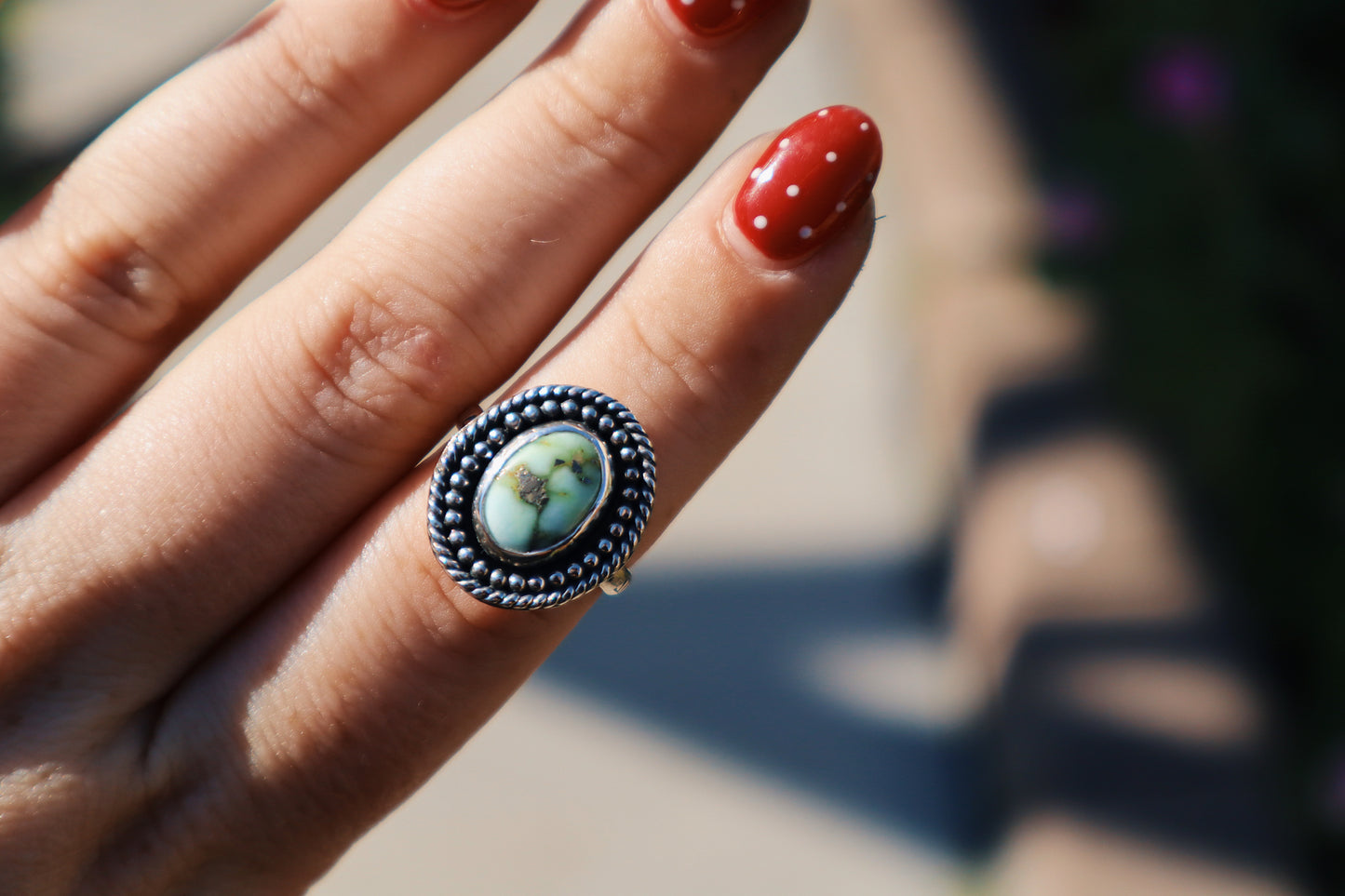 Palomino turquoise ring. Size 6. Sterling. Bead and rope accent.