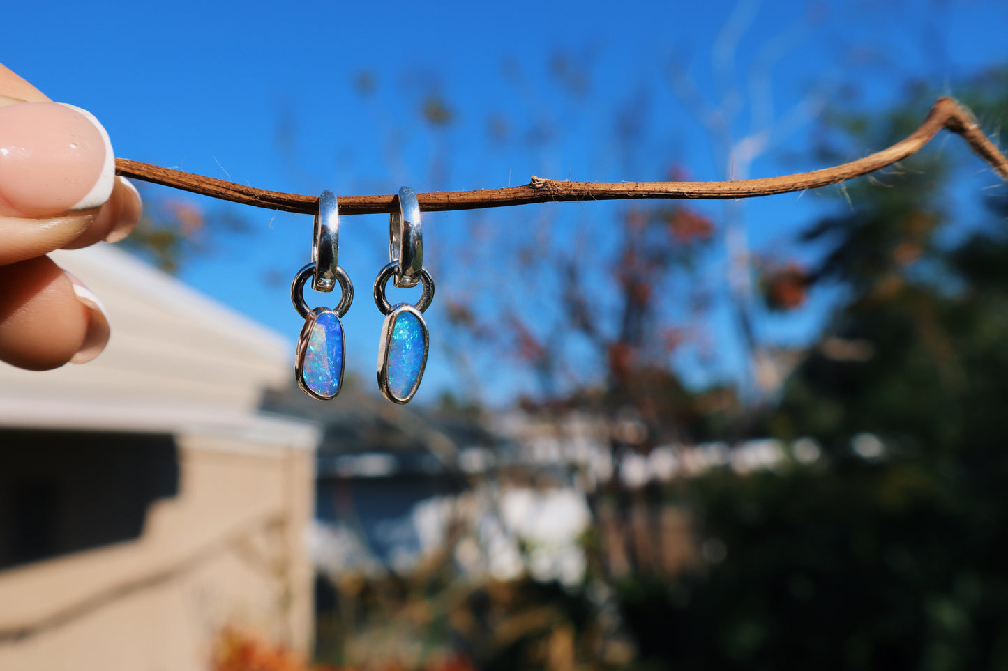 Crystal opal pair of huggie hoop earrings