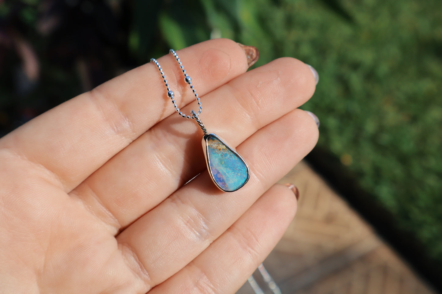 Beautiful swirly elongated opal pendant. 18 inch satellite chain