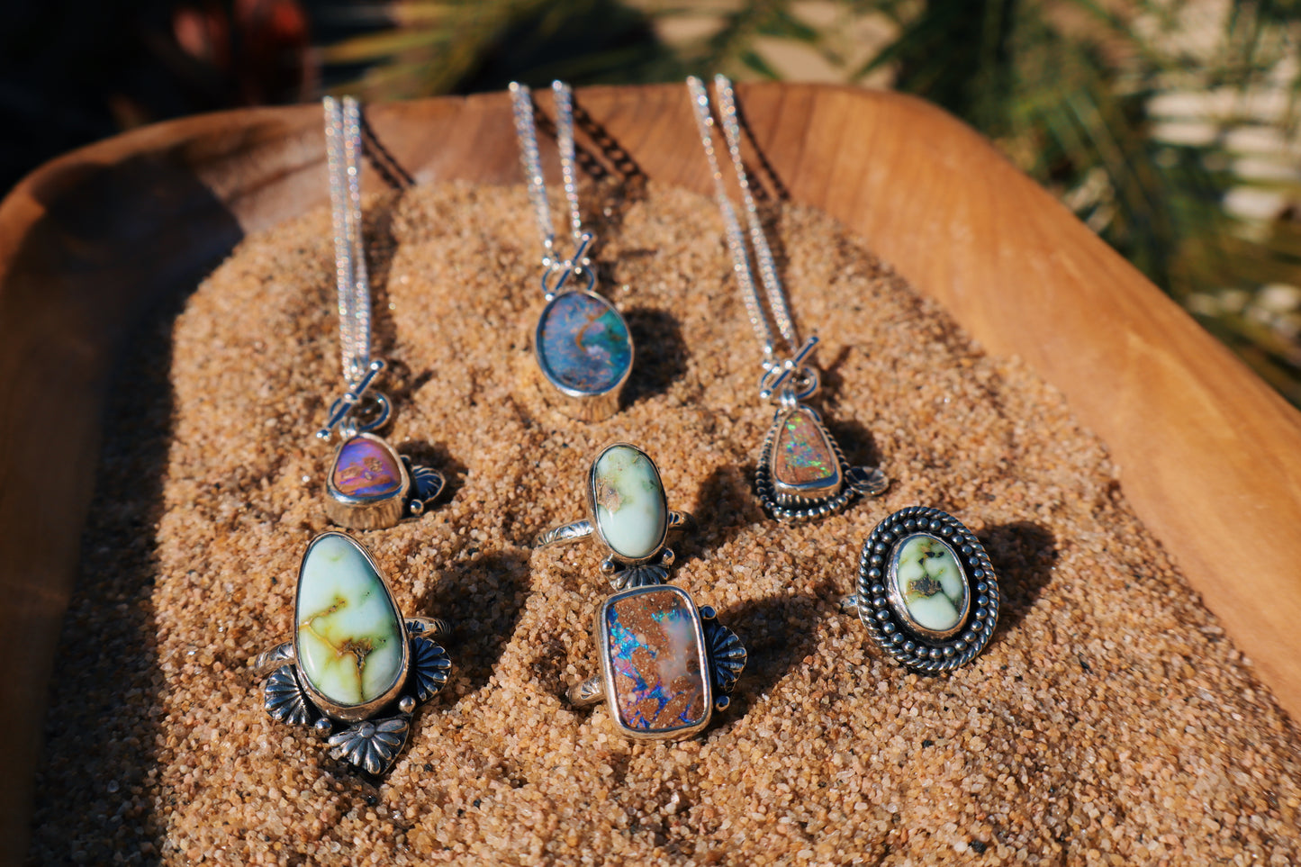 Sparkly green boulder opal toggle pendant with beaded and floral accents. 18in flat curb chain. Sterling silver.