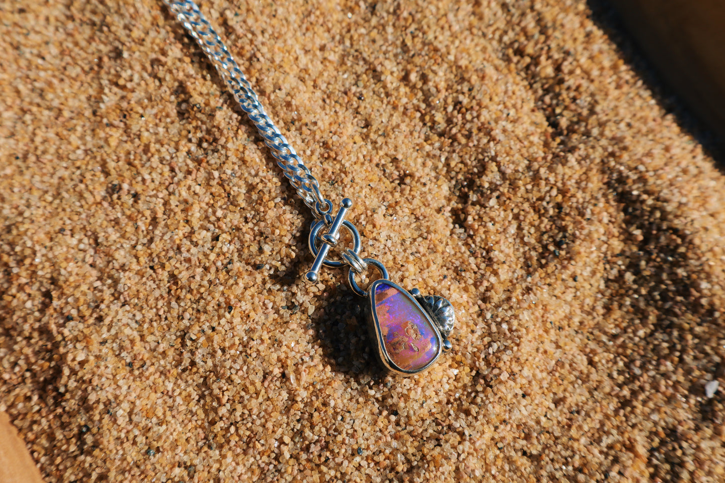 Purple Tear drop opal, 18in flat curb chain with toggle clasp. Sterling silver.