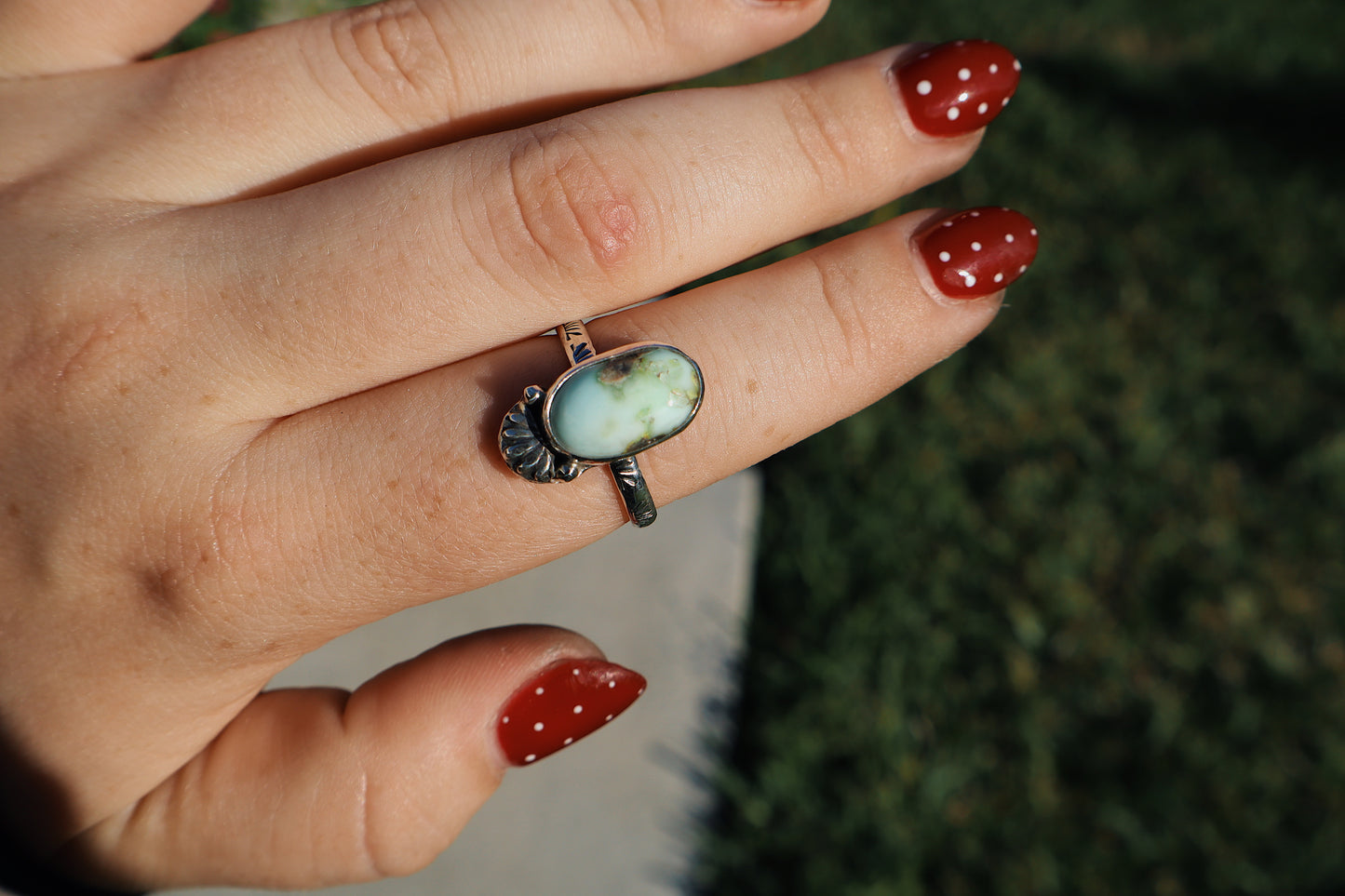 Palomino turquoise “cactus flower” ring size 8, Sterling.