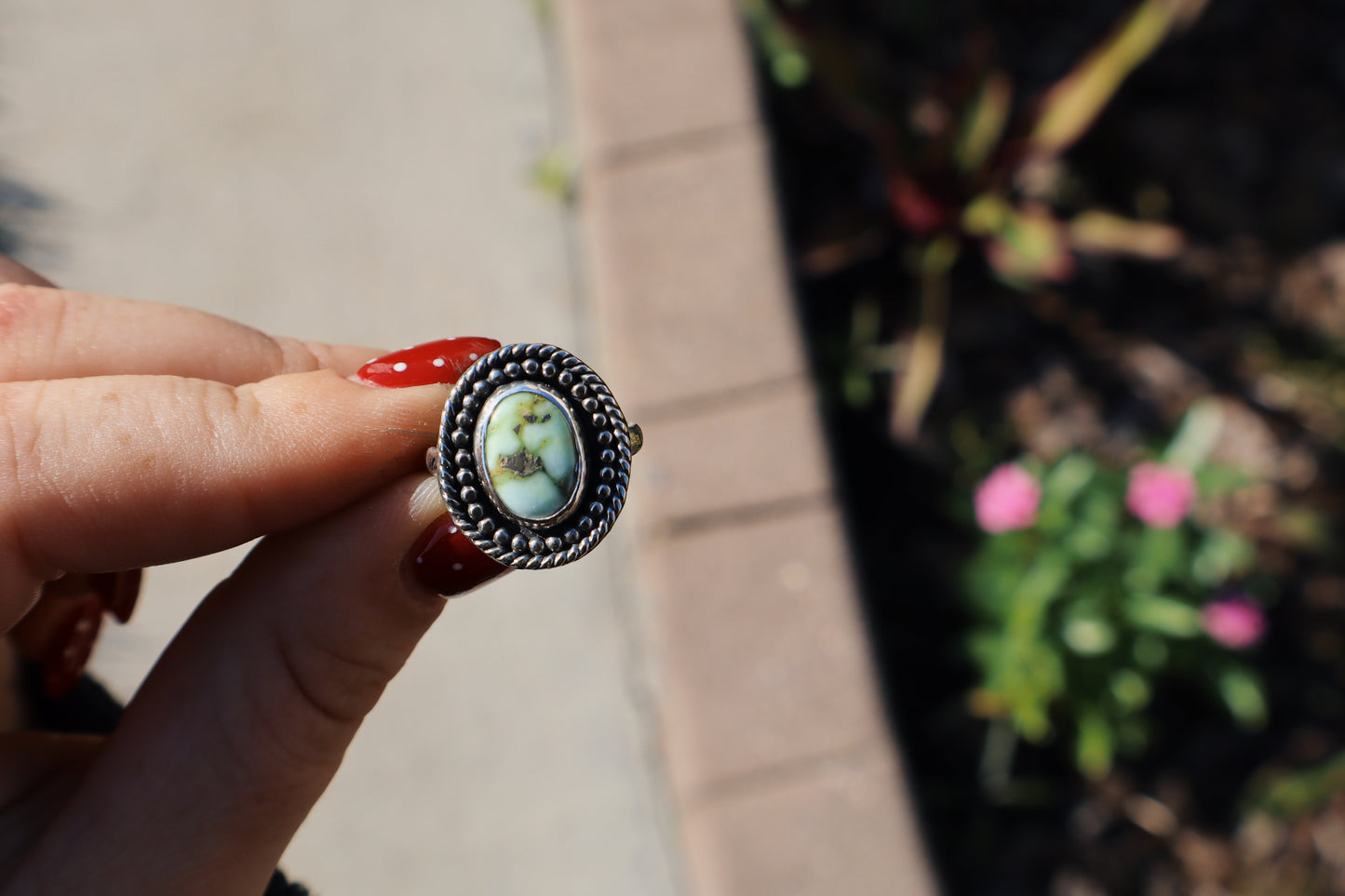 Palomino turquoise ring. Size 6. Sterling. Bead and rope accent.