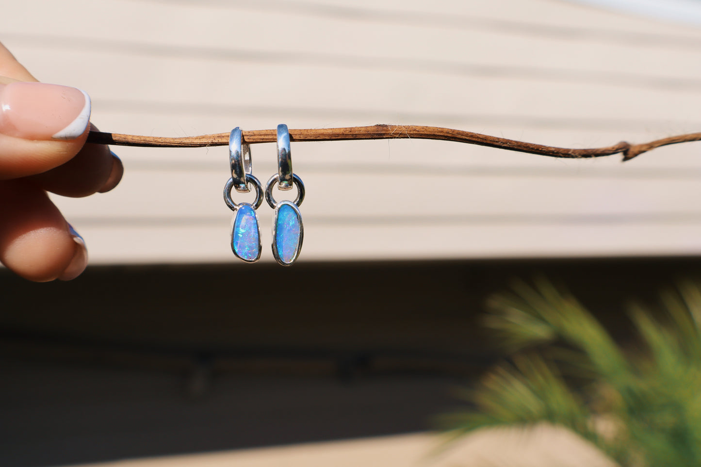 Crystal opal pair of huggie hoop earrings