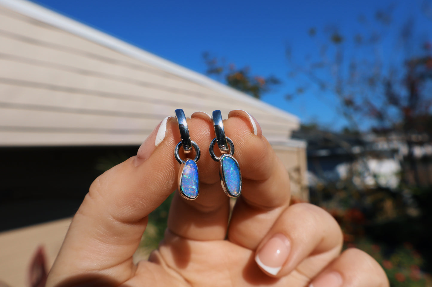 Crystal opal pair of huggie hoop earrings
