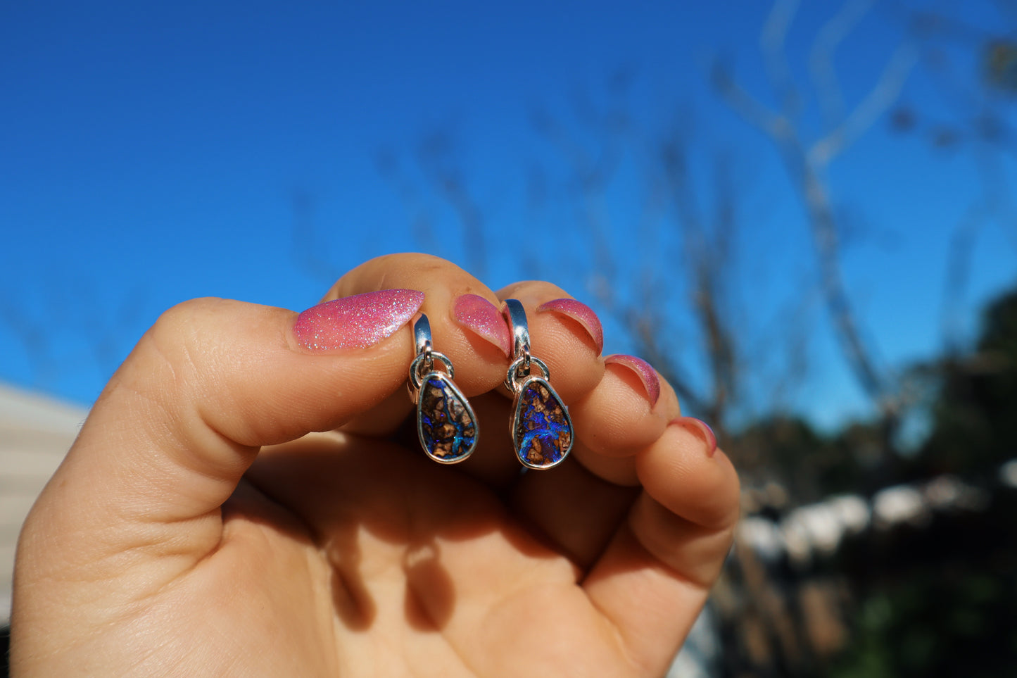 Purple wood, boulder opal huggie hoops. Sterling.