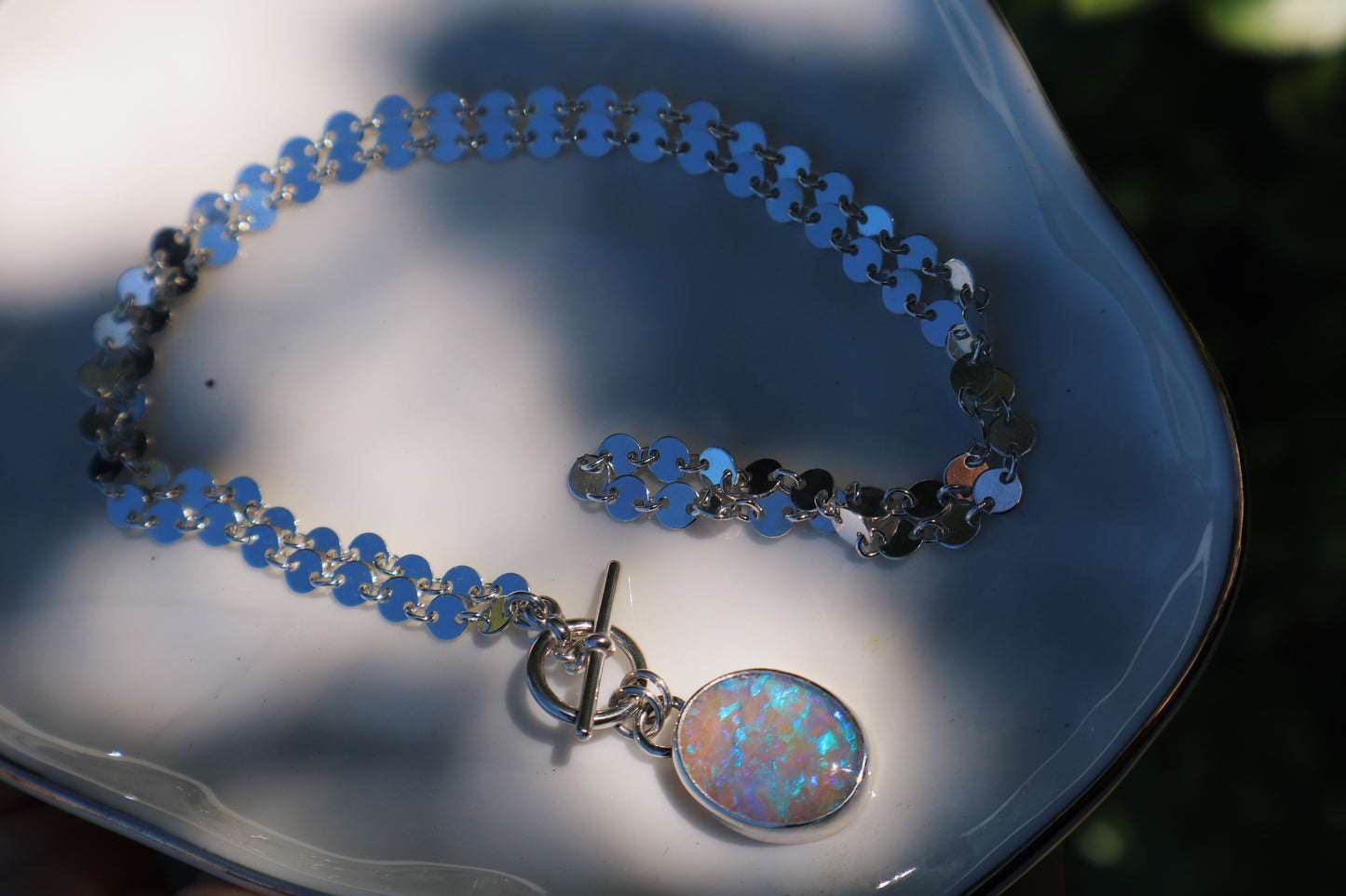 Flashy oval opal pendant