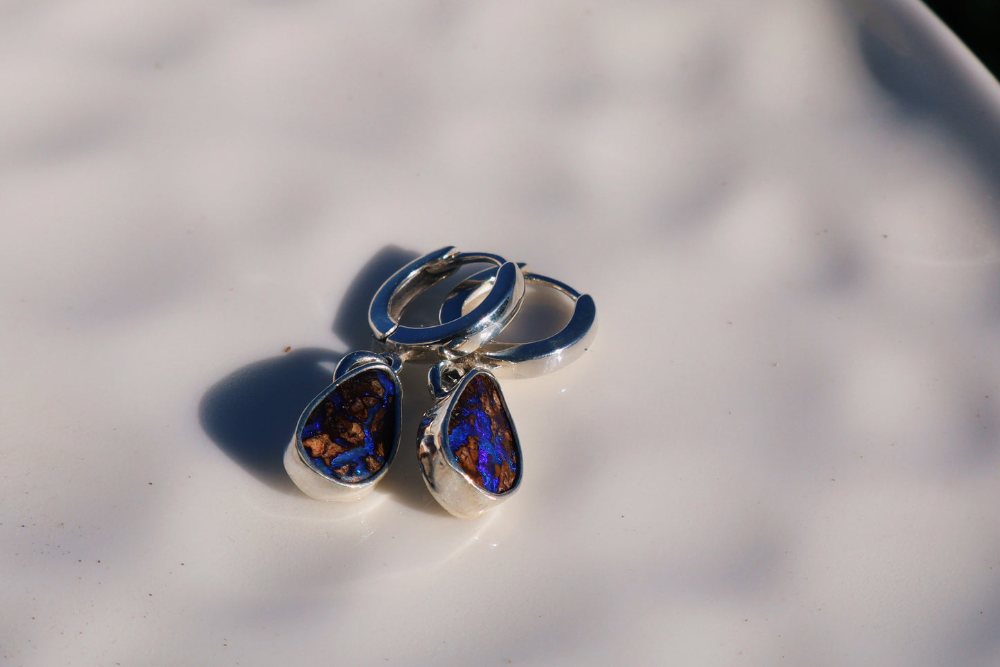 Purple wood, boulder opal huggie hoops. Sterling.