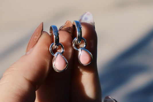 Pink conch huggie hoops