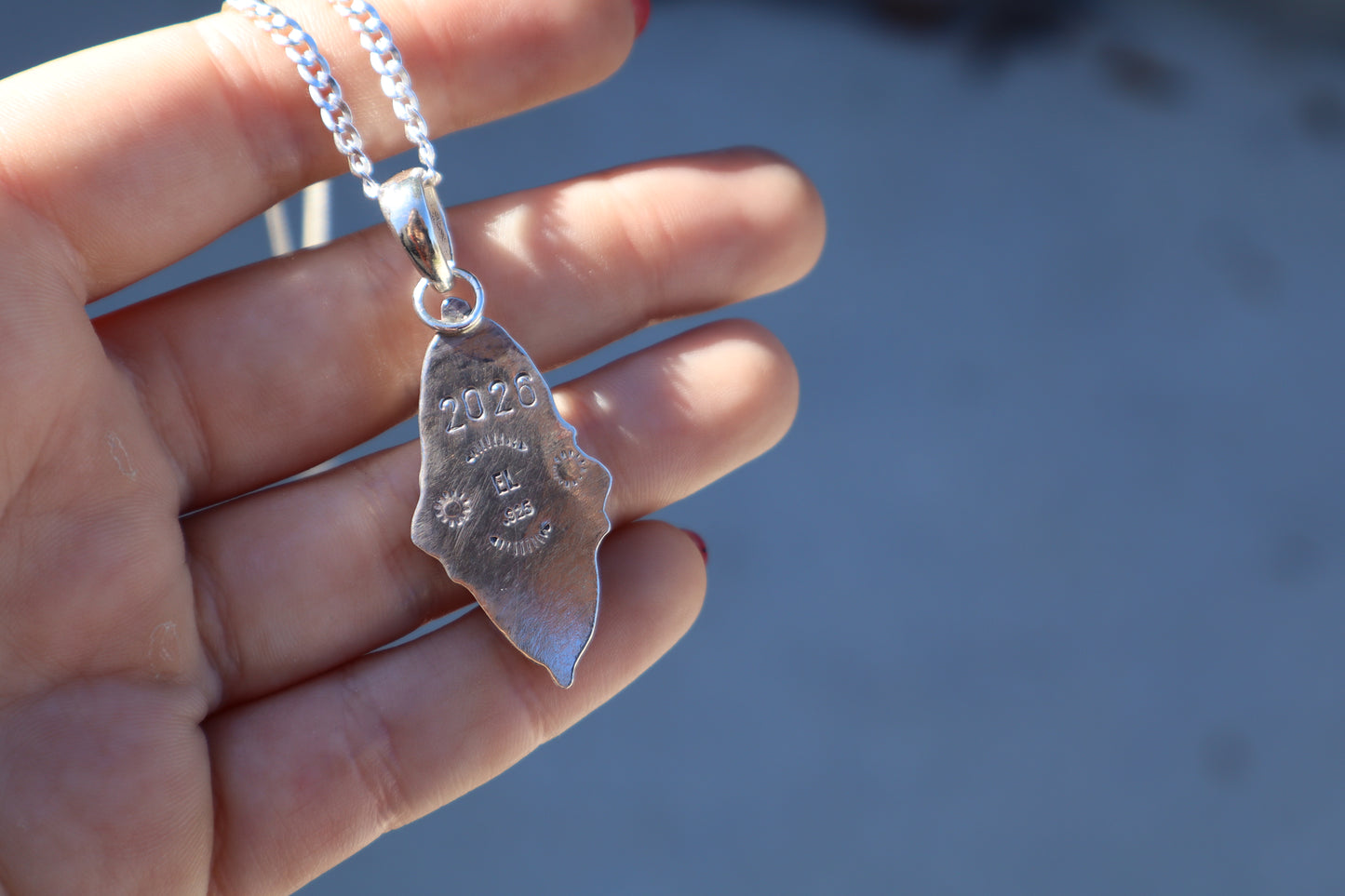 Stunning double purple opal pendant, 18in flat curb chain, hand forged accents.