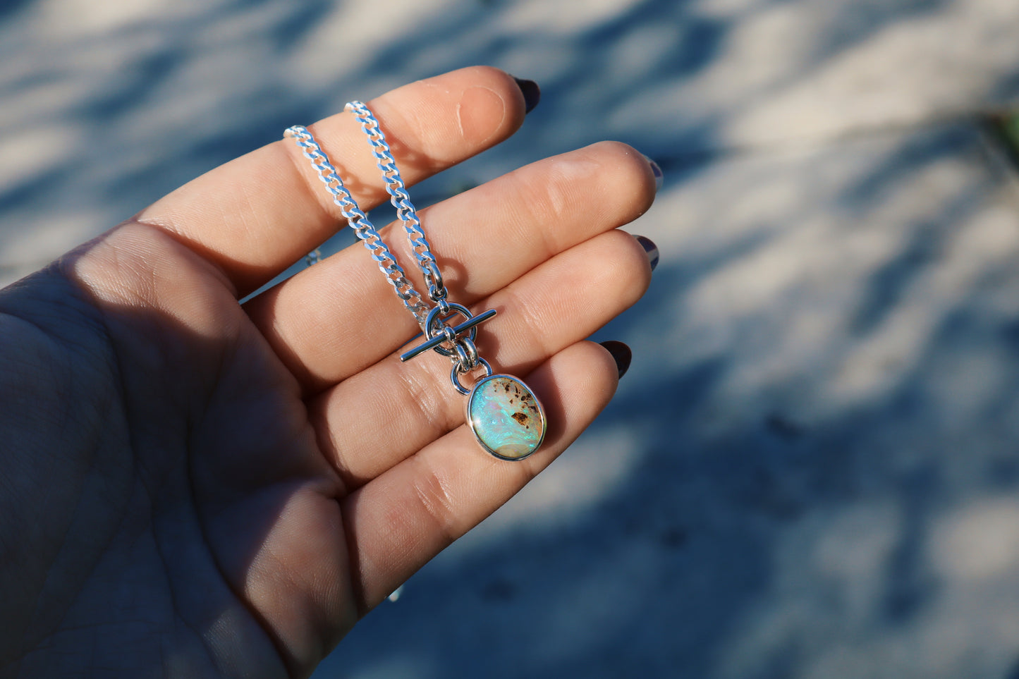 Stunning Teal wood boulder opal pendant, 18 inches, toggle clasp. Sterling silver, diamond cut curb chain.