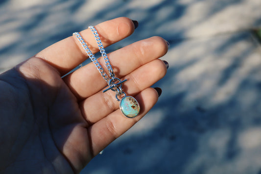 Stunning Teal wood boulder opal pendant, 18 inches, toggle clasp. Sterling silver, diamond cut curb chain.