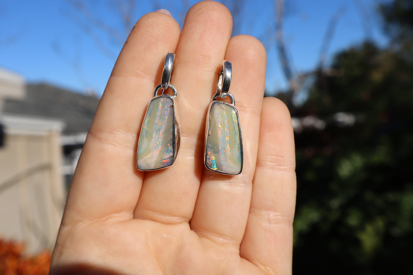 Flashy matching pair of pink swirl boulder opal huggie earrings. Sterling.