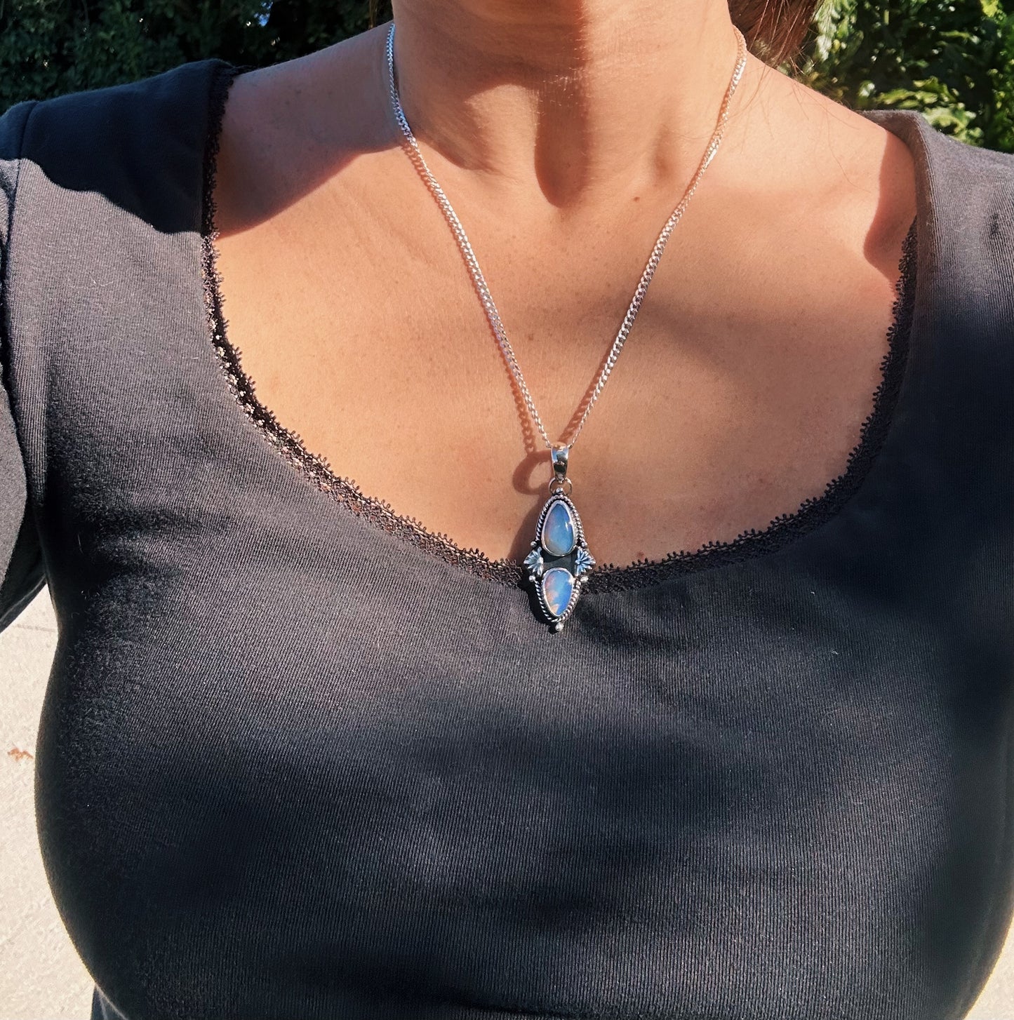 Stunning double purple opal pendant, 18in flat curb chain, hand forged accents.