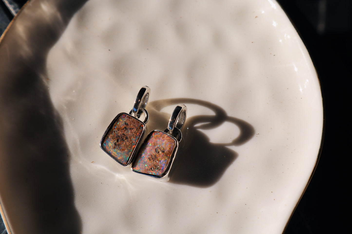 Sparkly matching pipe opal huggie earrings. Sterling silver