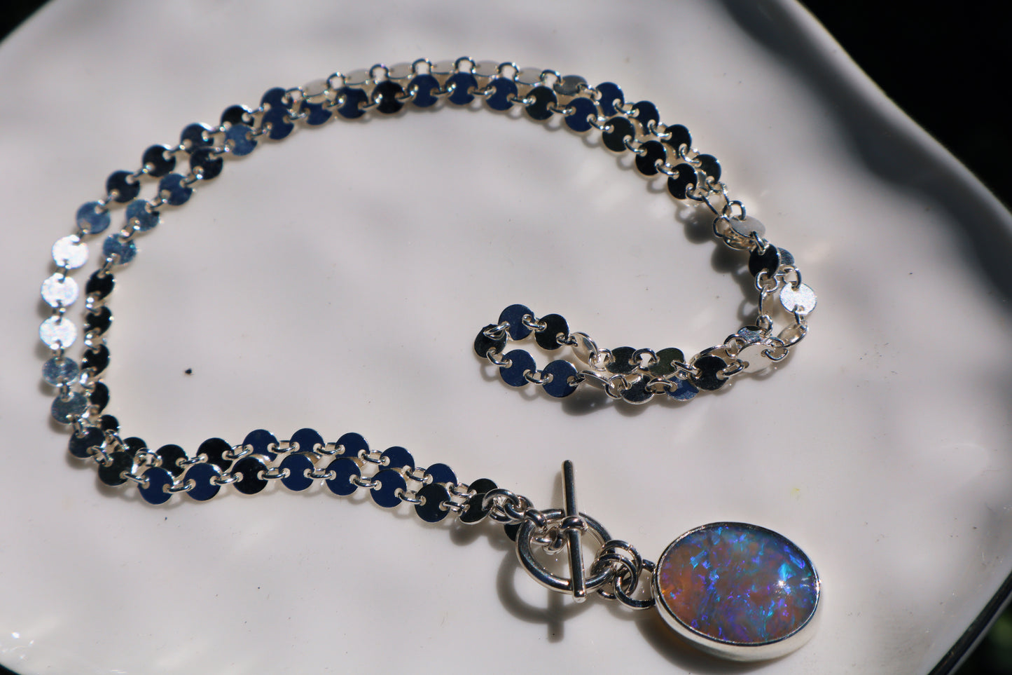 Flashy oval opal pendant