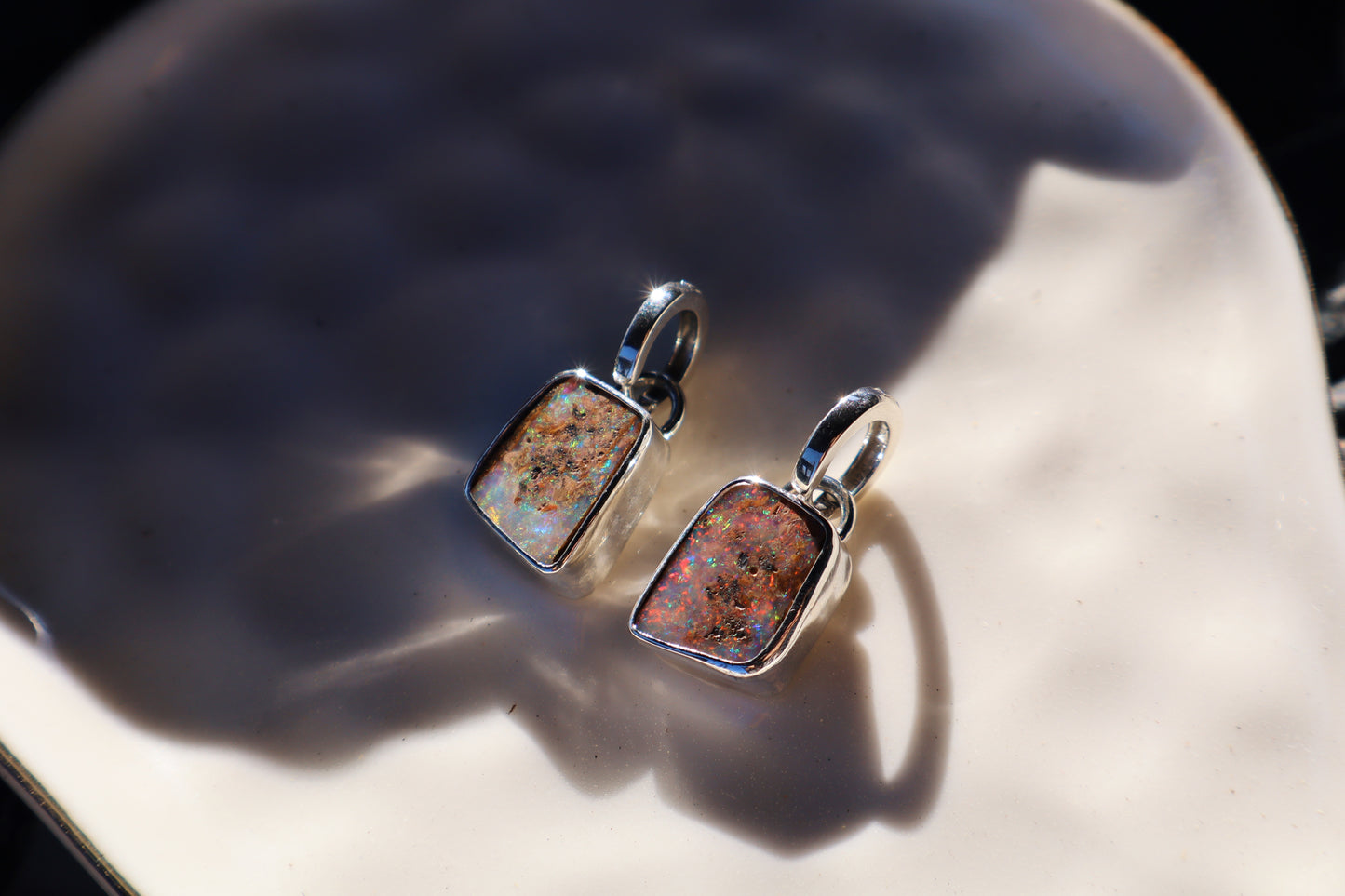 Sparkly matching pipe opal huggie earrings. Sterling silver