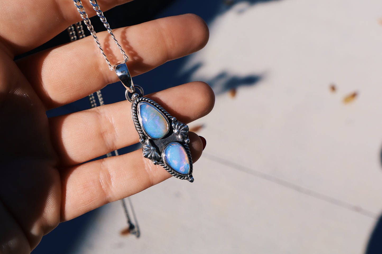 Stunning double purple opal pendant, 18in flat curb chain, hand forged accents.